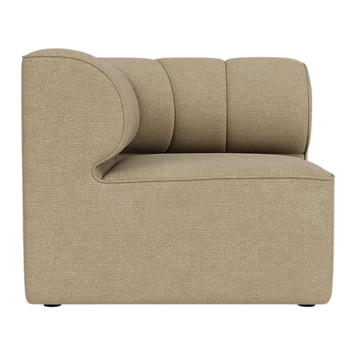 Beige upholstered sectional sofa with smooth, rounded edges and subtle horizontal tufting pattern.