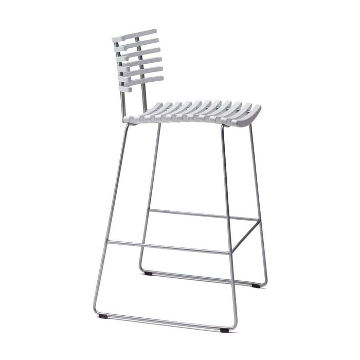 White metal bar stool with striped seat and backrest design, featuring a sleek, modern frame.