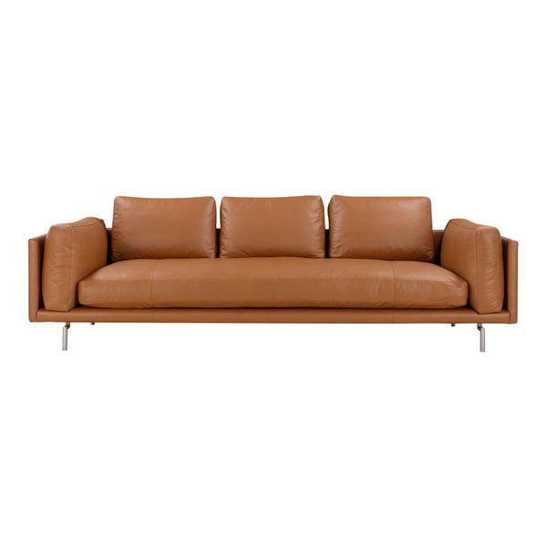 Tan leather sofa with smooth texture and minimalist design, featuring a modern, sleek appearance.
