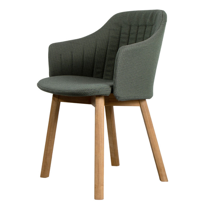 Stylish green upholstered chair with vertical quilted pattern and light wooden legs, perfect for modern decor.