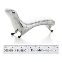 Silver and white design with a grid pattern, featuring sleek curves and black feet. Perfect for modern decor.