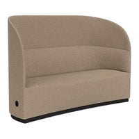 Curved beige upholstery with a subtle texture, featuring a sleek black base for modern accentuation.
