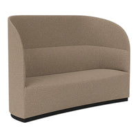 Curved sofa in a soft taupe fabric with a smooth, minimalist pattern and a sleek black base.