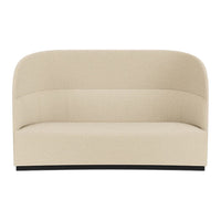 Beige curved sofa with smooth fabric texture and a modern black base, perfect for stylish interiors.