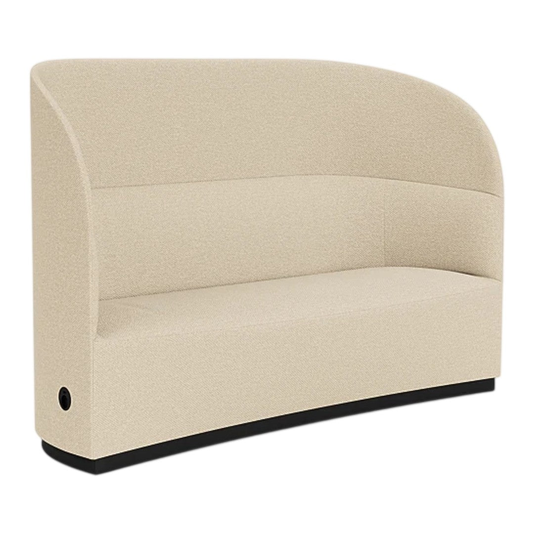 Beige curved sofa with a smooth texture and sleek black base, perfect for modern interiors.