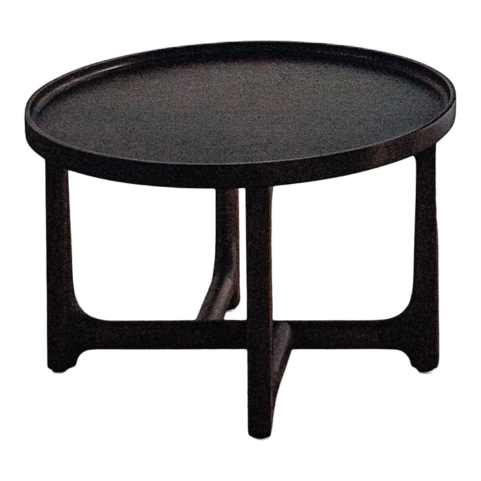 Black round coffee table with a smooth surface and simple, modern design. Dark wood legs enhance its contemporary style.