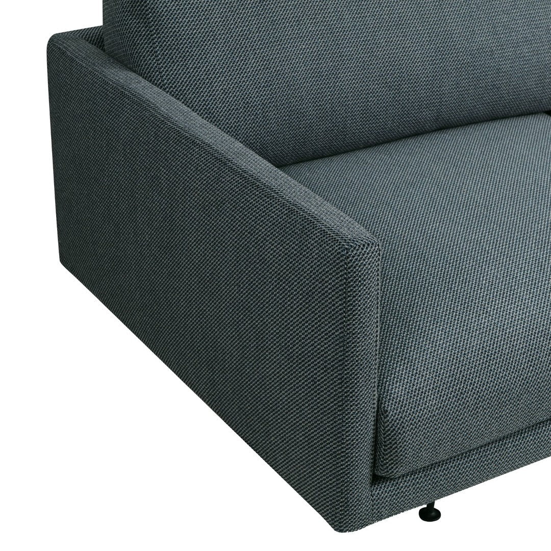 Gray textured fabric sofa with a modern, minimalist design and subtle geometric pattern.