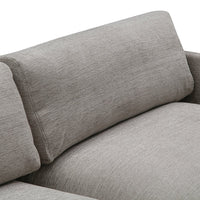 Light grey textured fabric sofa with subtle, woven pattern and plush backrest cushions. Ideal for modern interiors.