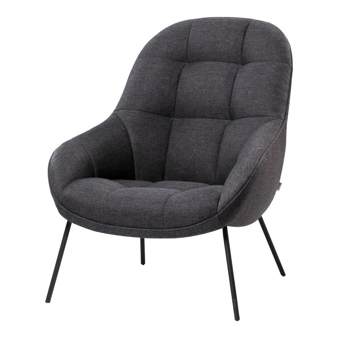 Plush dark gray armchair with tufted detailing and sleek black metal legs, perfect for modern decor.