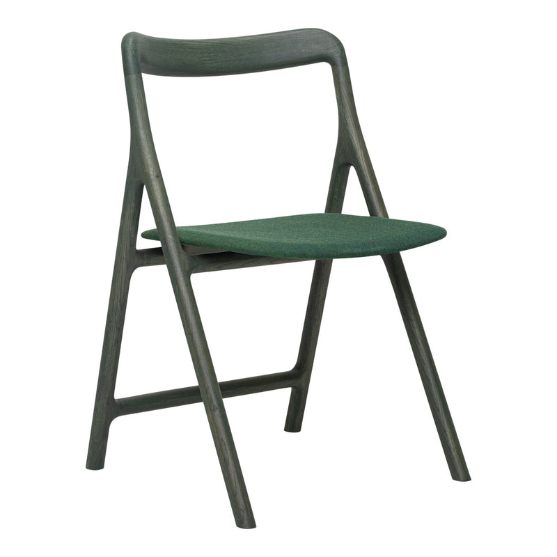 Green folding chair with a sleek matte finish and minimalist design, featuring solid colors and clean lines.