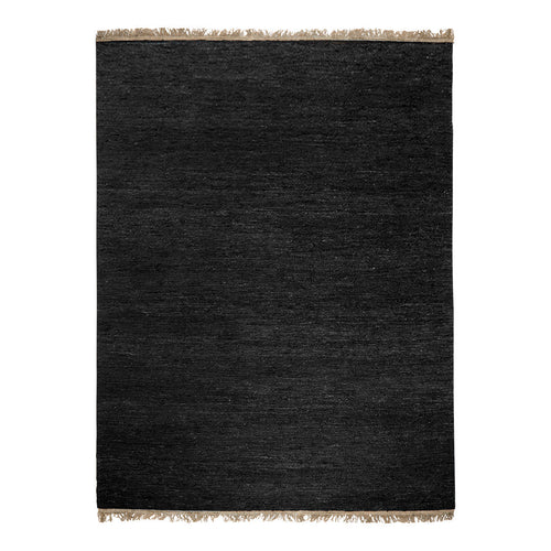 Black textured rug with fringed edges, offering a sleek and modern look for any decor.