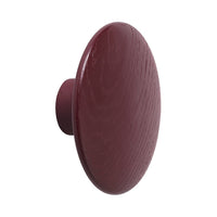 Round knob in rich burgundy with subtle wood grain pattern, perfect for stylish home decor accents.