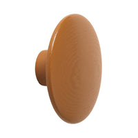 Oval cabinet knob in a warm terracotta hue with a smooth, glossy finish. Perfect for modern decor.