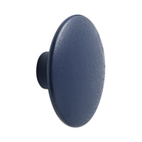 Navy blue circular knob with a textured finish, perfect for modern decor.