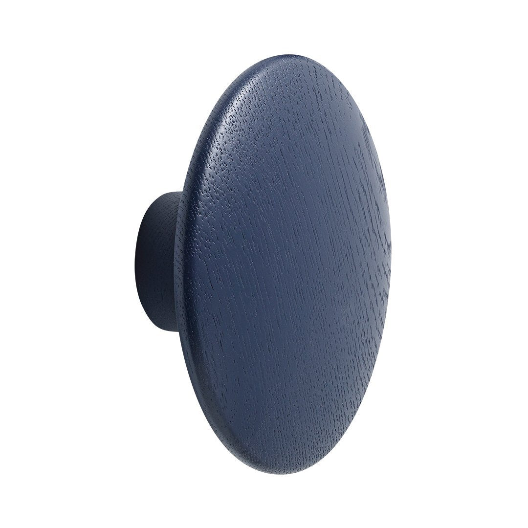 Navy blue circular knob with a textured finish, perfect for modern decor.