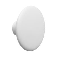 White circular wall hook with a smooth, matte finish. Minimalist design for modern decor.