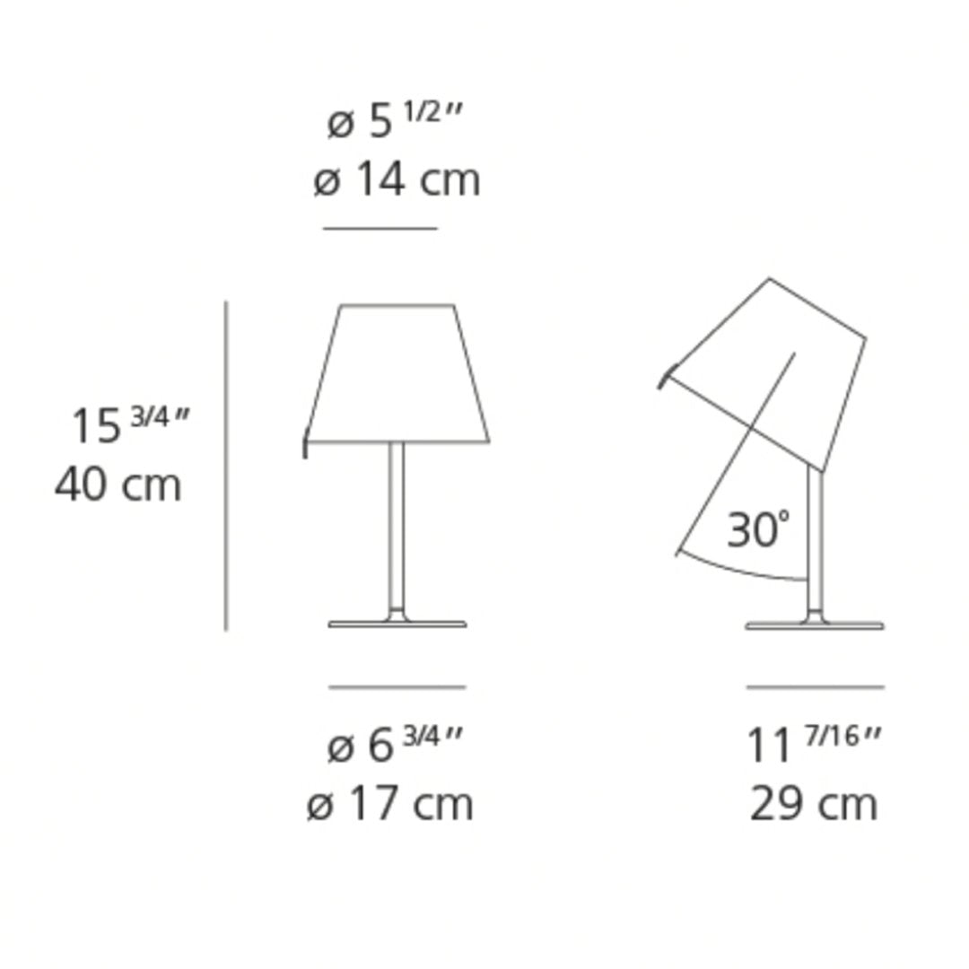 Black and white lamp with a geometric shade, showcasing clean lines and modern design. Perfect for minimalist decor.