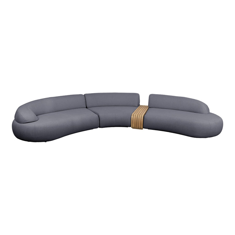 Curved gray sectional sofa featuring a sleek design and a natural wood accent for modern home decor.