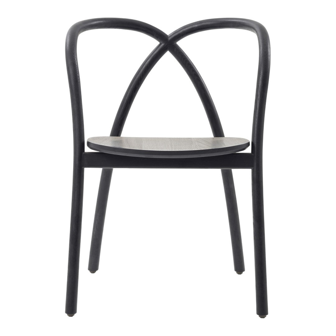 Black wooden chair with a minimalist design and curved backrest, featuring a natural wood seat.