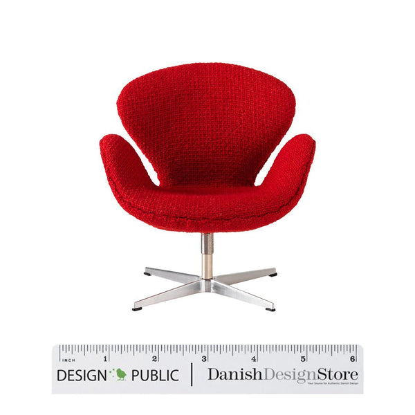 Red upholstered chair with a modern, textured pattern and sleek silver base. Perfect for adding bold color to any space.