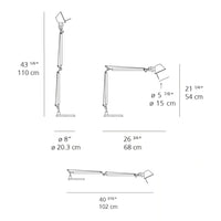 Modern adjustable desk lamp in sleek black and silver finish with minimalist design. Ideal for contemporary spaces.