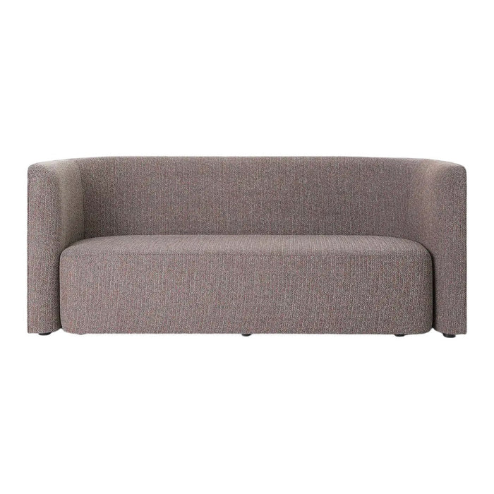 Contemporary curved sofa in soft grey fabric with subtle textured pattern, perfect for modern living spaces.