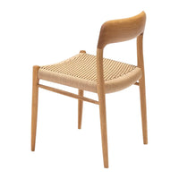 Light wood chair with a woven natural seat featuring a simple horizontal pattern. Perfect for modern decor.