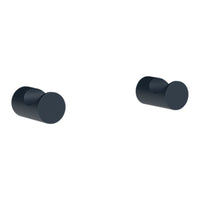 Sleek black round cabinet knobs, minimalist design, perfect for modern home decor.