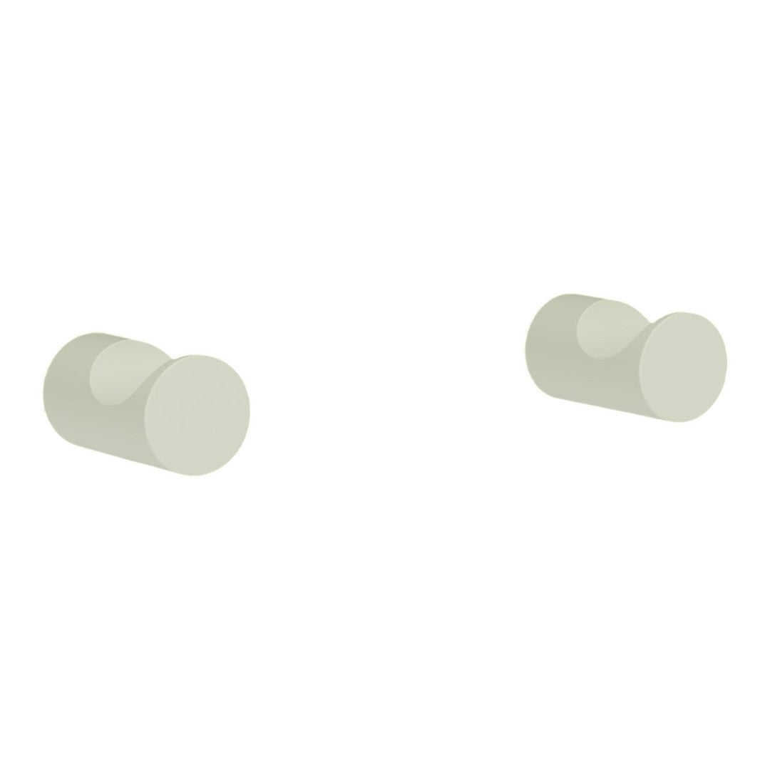 Smooth, round wall hooks in soft white color, featuring a minimalist design for modern decor.