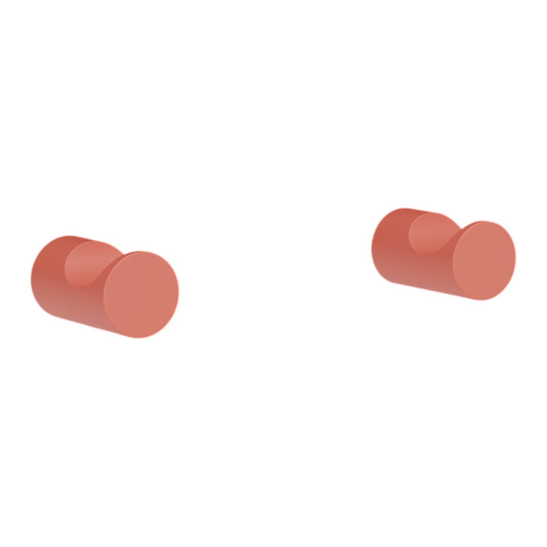 Rose-colored cylindrical ear plugs with a smooth, matte finish. Simple, modern design.