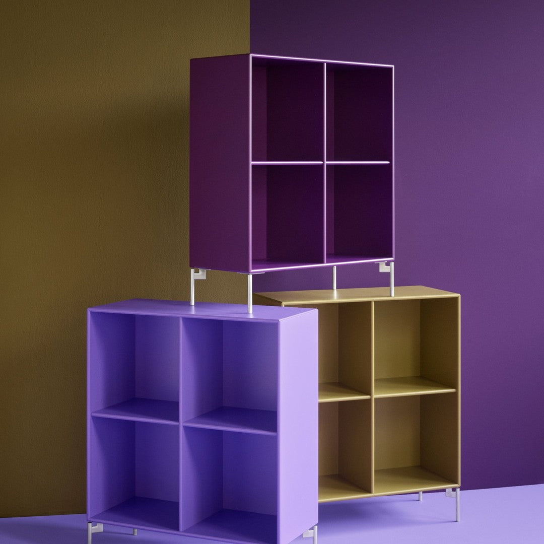 "Modern shelving units in vibrant purple and golden yellow, featuring clean lines and geometric patterns."