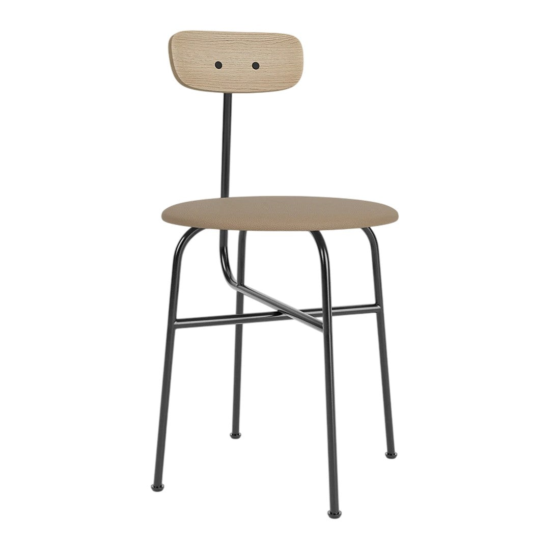 Beige circular seat and backrest with black metal legs and frame, minimalist design, industrial style.