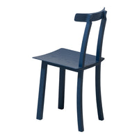 Navy blue chair with a sleek, minimalist design and smooth, solid color finish. Ideal for modern decor.