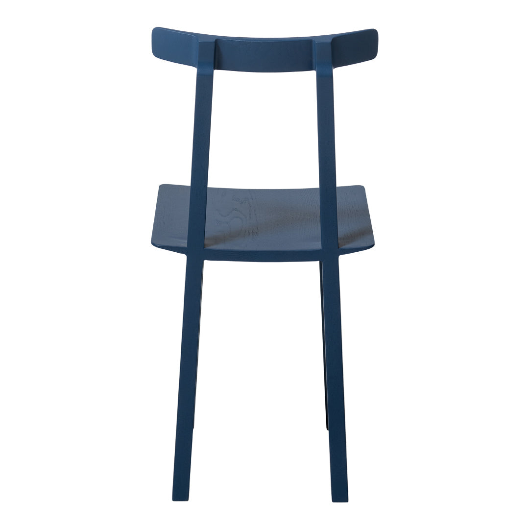 Navy blue chair with a minimalist design, featuring smooth, solid surfaces and straight, modern lines.