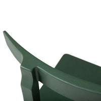 "Close-up of a sleek green wooden chair with a smooth, matte finish and minimalist design."