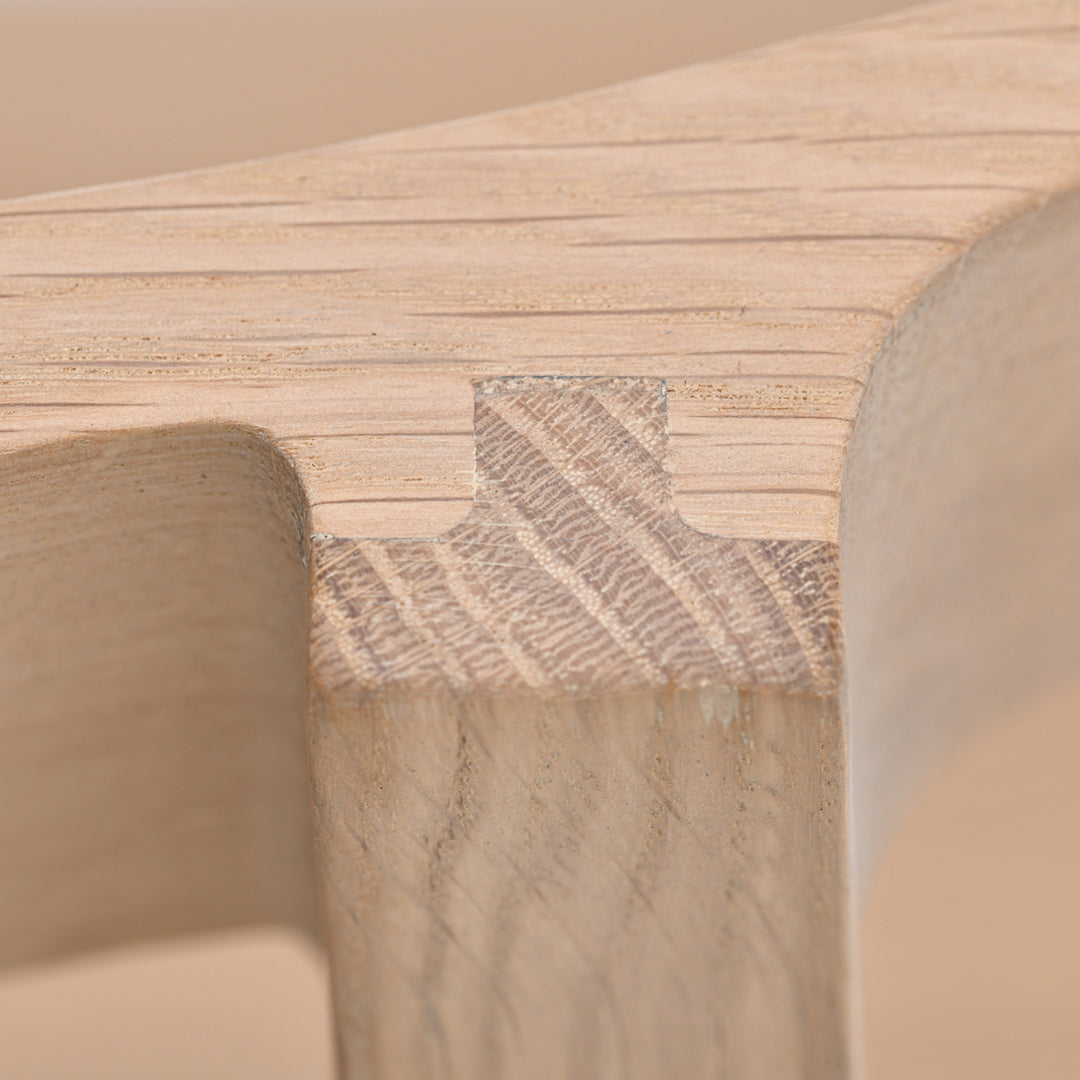Light natural wood with a subtle grain pattern, featuring a contrasting textured joint detail. Perfect for modern decor.