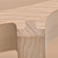 Light natural wood with a subtle grain pattern, featuring a contrasting textured joint detail. Perfect for modern decor.