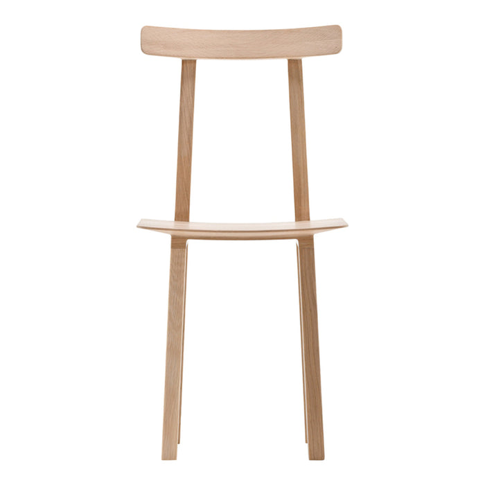Natural wood chair with a light beige finish and minimalist design, showcasing smooth lines and subtle textures.