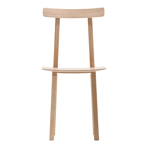 Natural wood chair with a light beige finish and minimalist design, showcasing smooth lines and subtle textures.