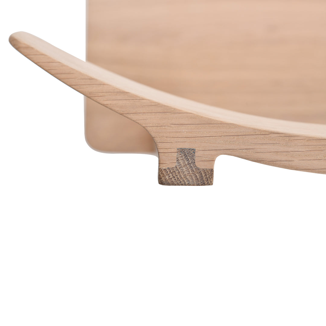 Light oak wood grain with smooth curves and subtle dark accent at the joint, showcasing natural elegance and craftsmanship.