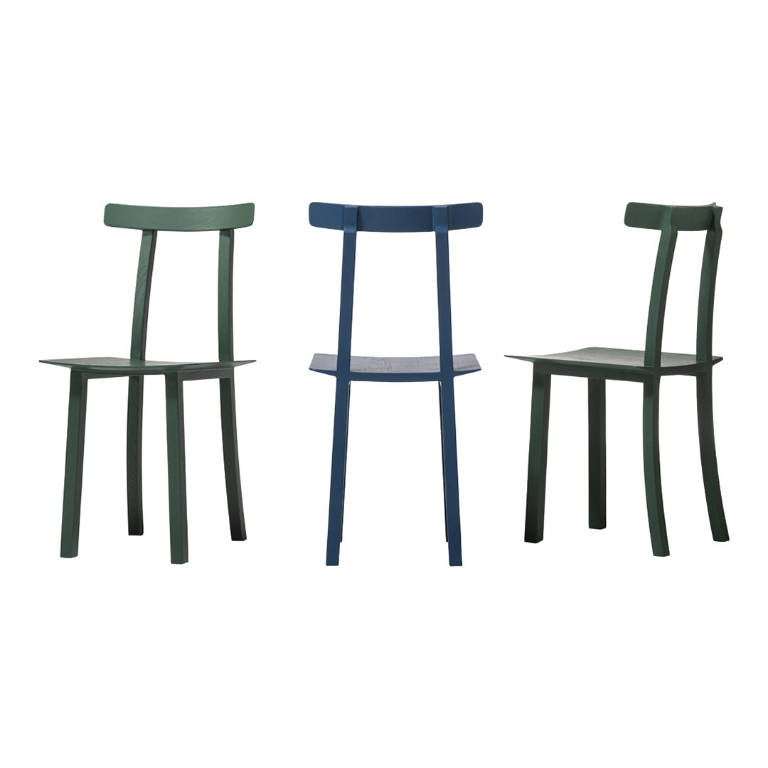 Three wooden chairs in dark green and deep blue, featuring sleek, minimalist designs. Perfect for modern interiors.
