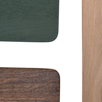 "Close-up of green, brown, and light wood patterns on a tabletop design, showcasing rich textures and colors."