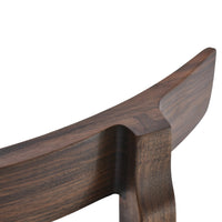 Dark wood grain with smooth, curved edges highlighting rich, warm brown tones and natural patterns.