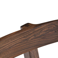 Close-up of rich, dark walnut wood grain pattern showcasing natural textures and elegance.