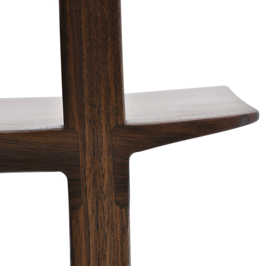 Dark wood shelf with smooth, clean lines and a minimalist design. Ideal for modern decor.
