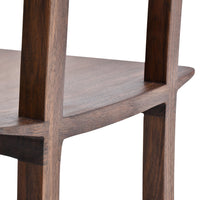 Close-up of a wooden chair in rich walnut color with smooth, sleek lines and subtle grain patterns.