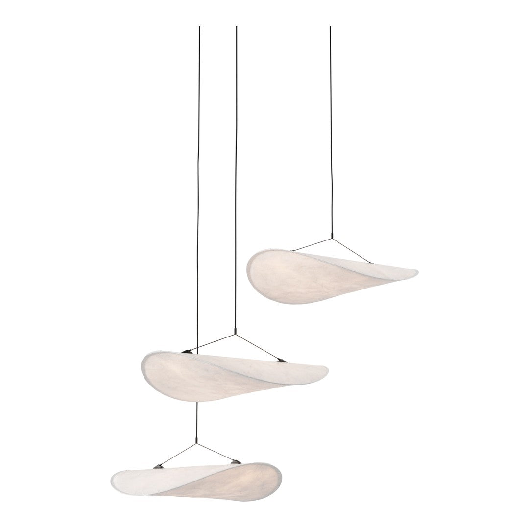 Modern hanging light fixture with soft, white shades and sleek, minimalist design. Perfect for contemporary spaces.