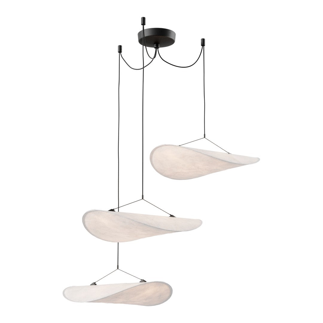 Stylish three-tier pendant light with smooth white shades and a black metal ceiling mount. Modern, minimalist design.