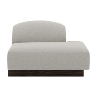 Light gray upholstered chair with a smooth, minimalist design and a dark wooden base. Ideal for modern decor.