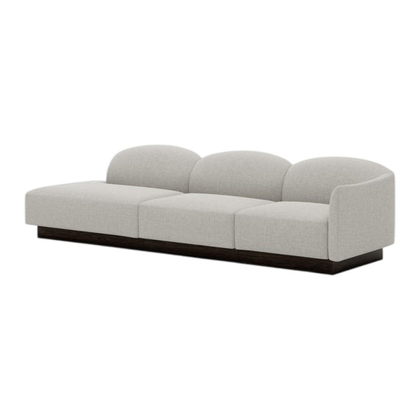 Light gray sofa with subtle texture and smooth curves, featuring a dark wood base for a modern look.